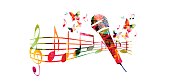colorful-music-background-with-microphone-and-music-notes-vector-id545551794